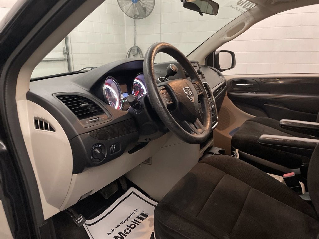 Used 2013 Dodge Grand Caravan SE with VIN 2C4RDGBG4DR741035 for sale in Adrian, MI